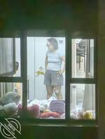 偷拍骚邻居没穿内衣真空1