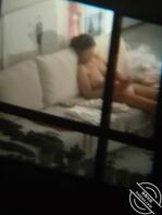 偷拍对面楼的少妇1